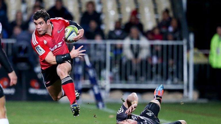 Corey Flynn of the Crusaders jumps out of a tackle during the Super Ruby Semi Final match between the Crusaders and th