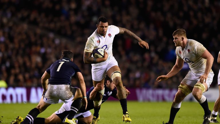 Courtney Lawes of England runs at the Scotland defence