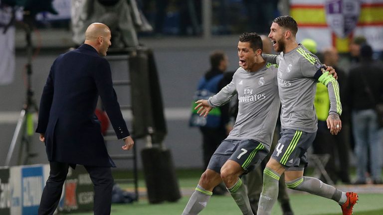 Real Madrid's Cristiano Ronaldo celebrates with coach Zinedine Zidane and Sergio Ramos 