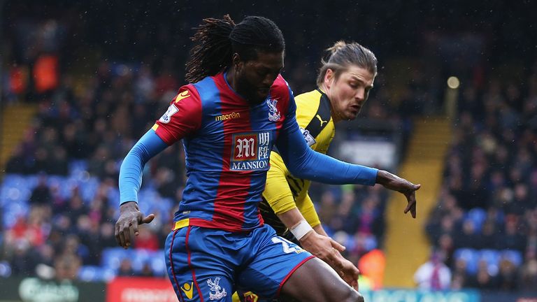 LONDON, ENGLAND - FEBRUARY 13:  Emmanuel Adebayor of Crystal Palace and Sebastian Prodl of Watford compete for the ball during the Barclays Premier League 