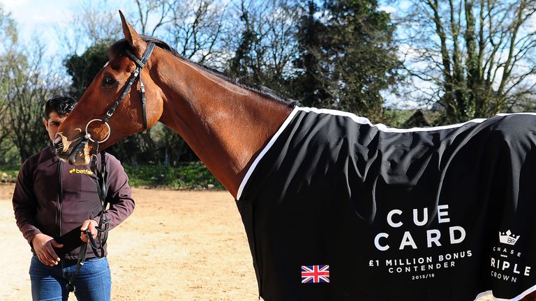 Cue Card poses with a coat relating to the Million Pound bonus