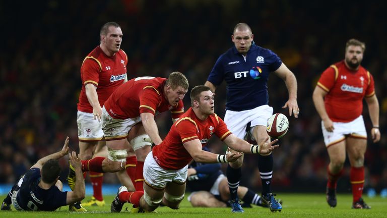 Dan Lydiate of Wales passes the ball during the Six Nations match between Wales and Scotland at the Principality Stadium