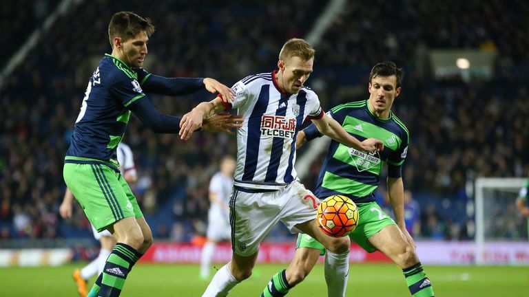 Darren Fletcher controls the ball for West Bromwich Albion under pressure from Swansea's Federico Fernandez (left) and Jack Cork