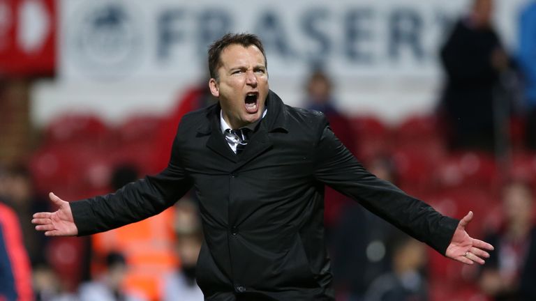 Derby County caretaker manager Darren Wassall celebrates his first win in charge
