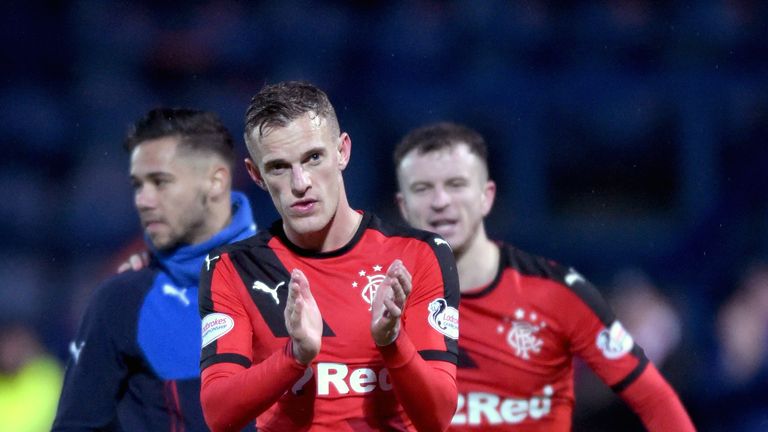 Dean Shiels and Andy Halliday applaud the Rangers fans after their narrow win