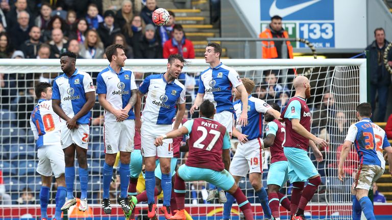Dimitri Payet curls a free-kick over the Blackburn wall and into the net