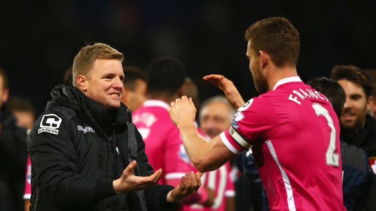 Eddie Howe (left) Manager of Bournemouth and Simon Francis celebrate