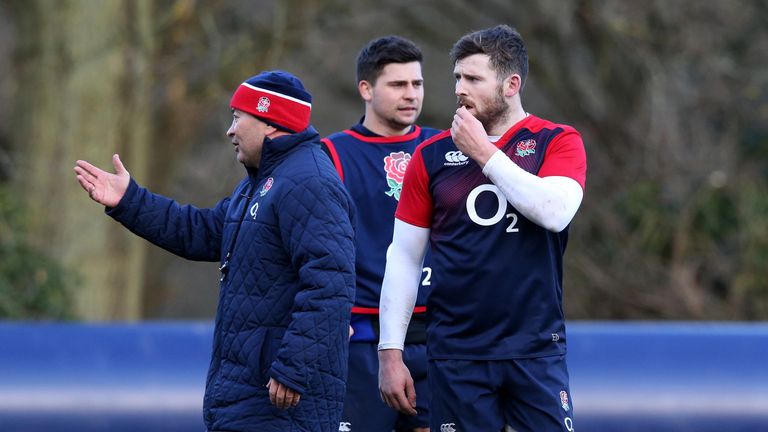 Elliot Daly (right) listens to Eddie Jones during England training at Pennyhill Park on February 23, 2016