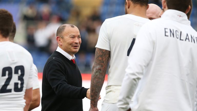 Eddie Jones congratulates his England players following their 40-9 victory over Italy