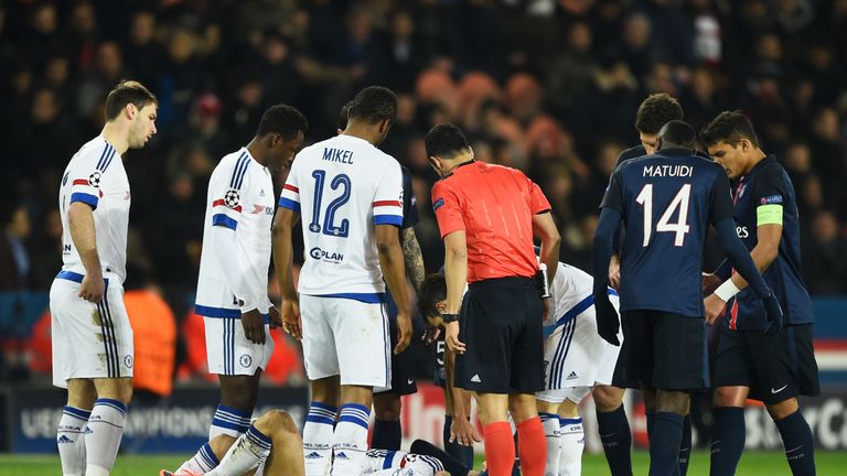 Eden Hazard is injured during the Champions League round of 16 first leg match between Paris Saint-Germain and Chelsea in Paris on February 16, 2016