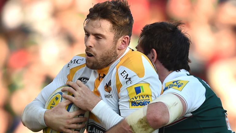 Wasps' Elliot Daly (left) is tackled by Leicester Tigers' Matt Smith during the Aviva Premiership match at Welford Road, Leicester.