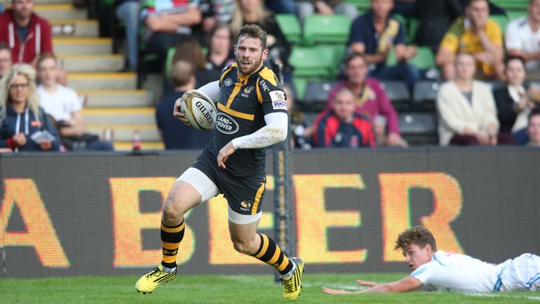 Elliot Daly of Wasps breaks clear to score a try against Exeter Chiefs during the Singha Premiership Rugby 7's Series finals 