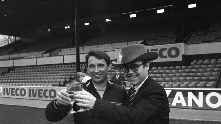 Watford manager Graham Taylor and chairman Elton John on the Vicarage Road pitch