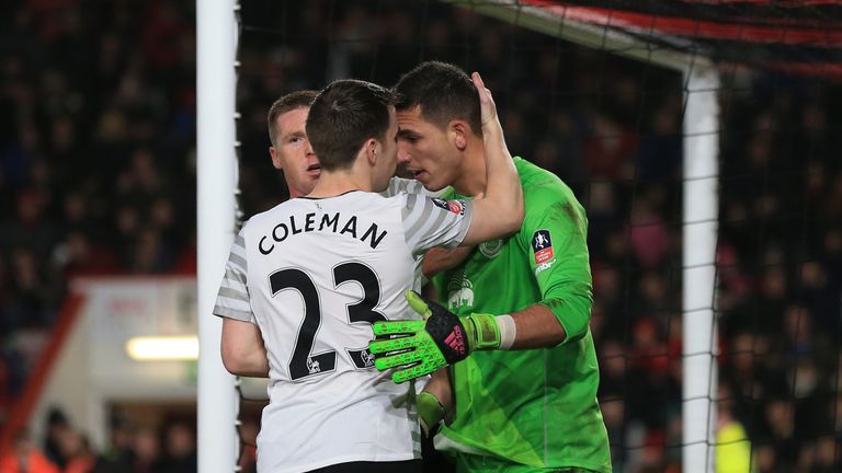 Everton's Seamus Coleman congratulates goalkeeper Joel Robles upon his saving a penalty from Bournemouth's Charlie Daniels during the FA Cup tie