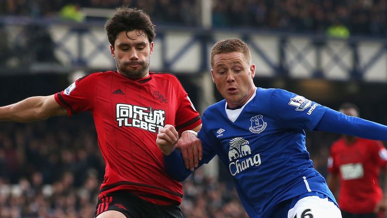 LIVERPOOL, ENGLAND - FEBRUARY 13: James McCarthy of Everton and Claudio Yacob of West Bromwich Albion compete for the ball during the Barclays Premier Leag