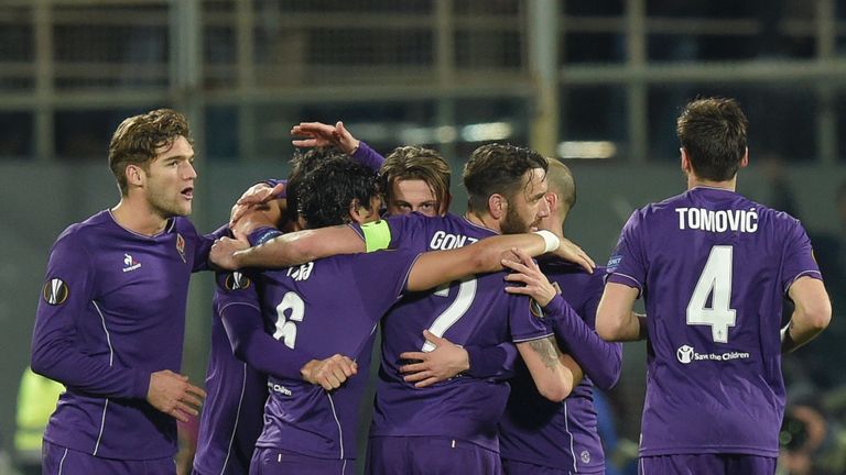 Fiorentina's forward from Italy, Federico Bernardeschi (C) celebrates with teammates after scoring during the match Fiorentina vs Tottenham 