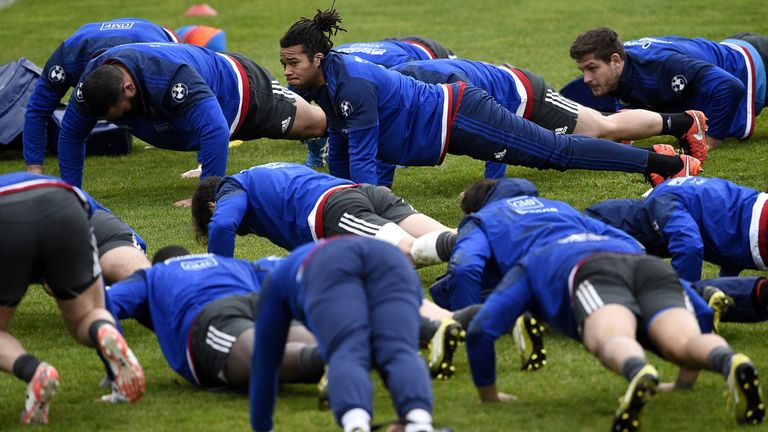 France wing Teddy Thomas (C, up) during a training session
