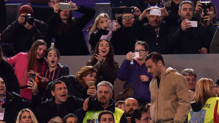 Exiled Roma captain Francesco Totti watched from the stands