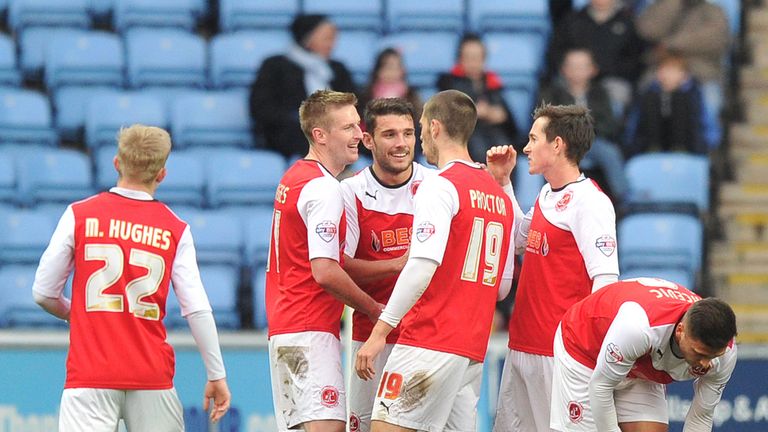 Fleetwood Town's Gareth Evans (centre) is congratulated on scoring his team's opening goal at the Ricoh Arena, Coventry, December 2014