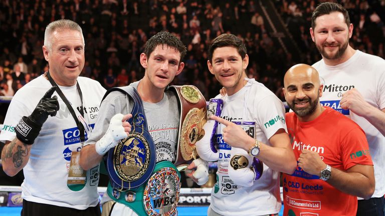 Gavin McDonnell (centre left) celebrates with brother Jamie (centre right) and trainer Dave Coldwell (second right) after beating Jorge Sanchez (not pictur