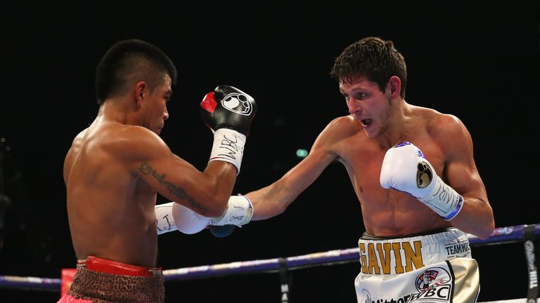 Gavin McDonnell hits Jorge Sanchez with a right