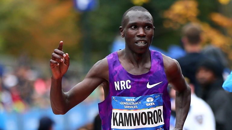 Geoffrey Kamworor of Kenya crosses the finish line in second place at the 2015 New York City Marathon