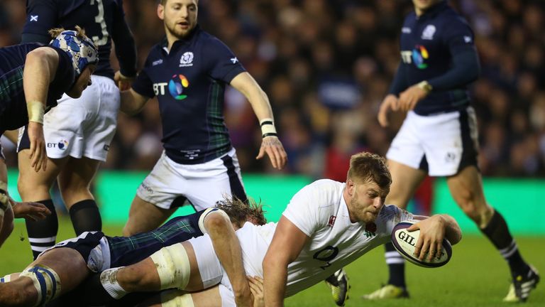 Lock George Kruis of England crashes over to score the opening try during the RBS Six Nations match between Scotland and England at Murrayfield