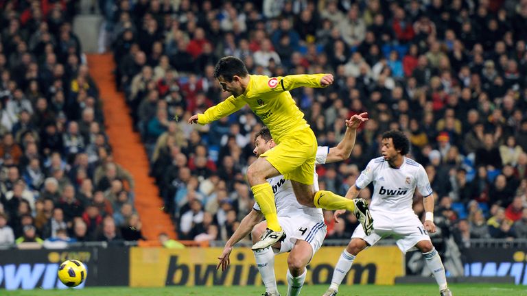 Giuseppe Rossi vies with Real Madrid's Xabi Alonso during his time at Villarreal