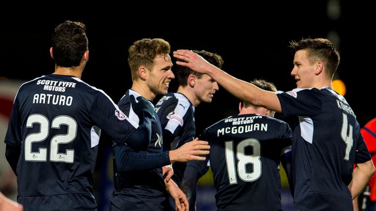 Greig Stewart (second from left) scored a double as Dundee progressed