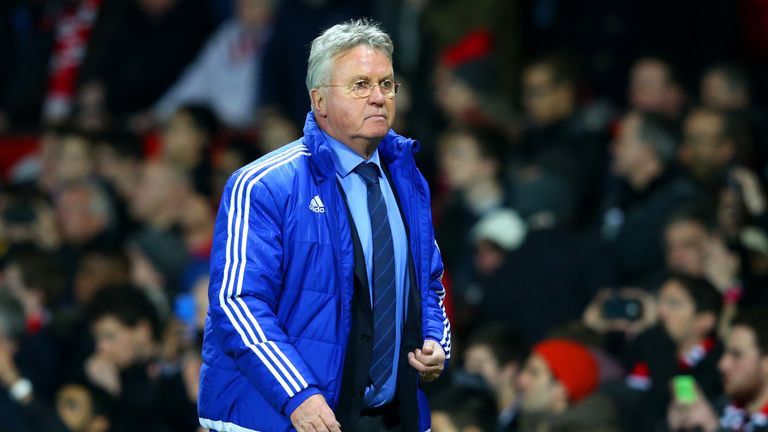 MANCHESTER, ENGLAND - DECEMBER 28:  Guus Hiddink, manager of Chelsea looks on as he walks back to the changing room at half time during the Barclays Premie