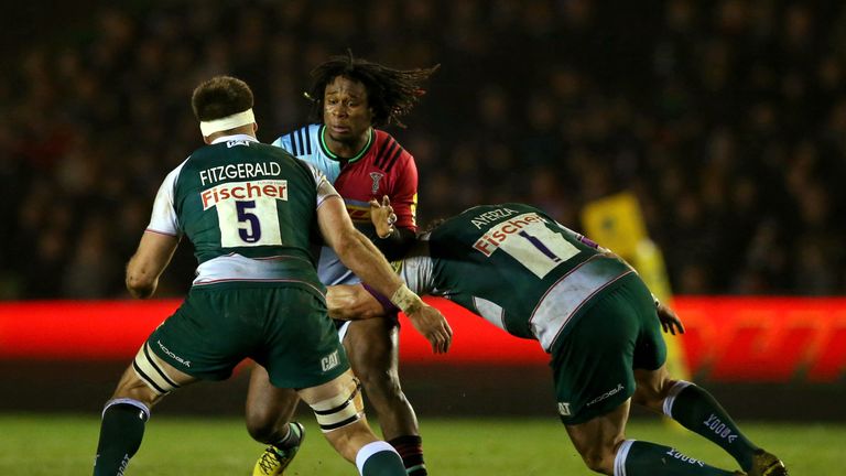 Marland Yarde of Harlequins takes on Marcos Ayerza and Mike Fitzgerald of Leicester Tigers