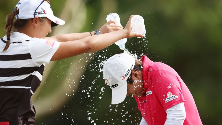 Nomura enjoys an impromptu shower after her triumph at The Grange