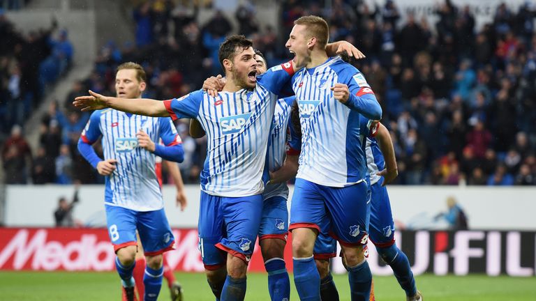 (L-R) Kevin Volland, Mark Uth and Pavel Kaderabek of Hoffenheim celebrate after the third goal