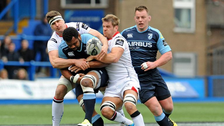 Cardiff Blues' Manoa Vosawai spills the ball while being tackled by Ulster's Robbie Diack and Chris Henry.n                           