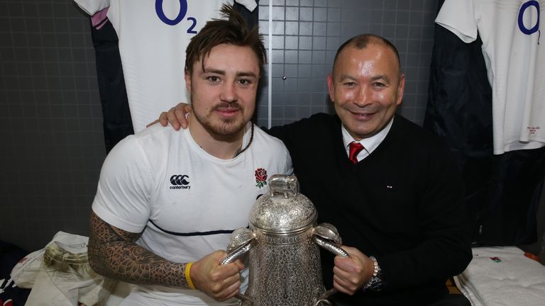 Jack Nowell and Eddie Jones pose with the Calcutta Cup following their team's victory during the match between Scotland and England 