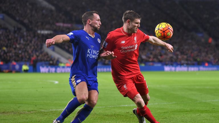  James Milner of Liverpool and Danny Drinkwater of Leicester City compete for the ball during the Barclays Premier League