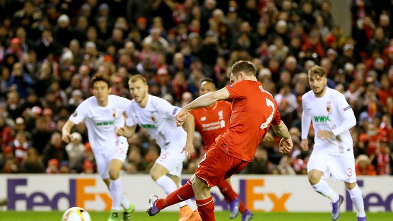 Liverpool's James Milner scores his side's first goal from the penalty spot 