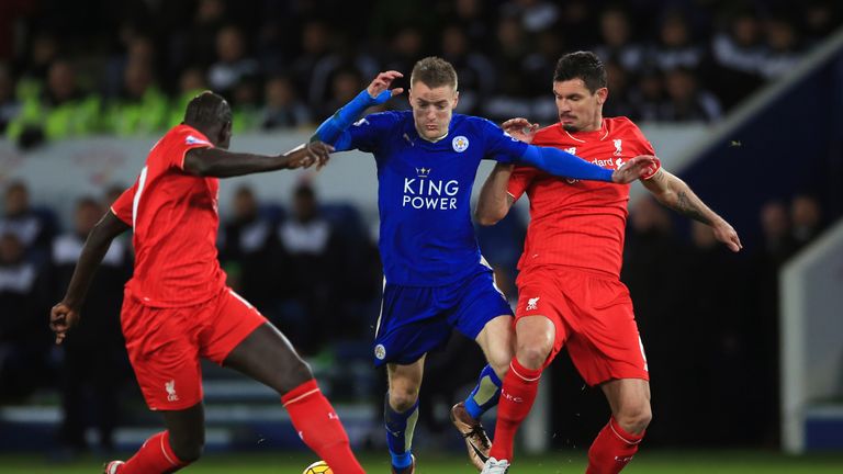 Leicester City's Jamie Vardy (centre) battles for the ball with Liverpool's Dejan Lovren (right) and Liverpool's Mamadou Sakho 