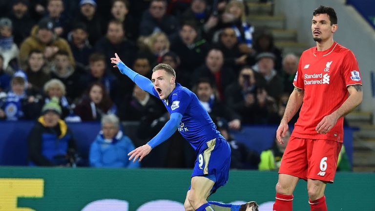 Leicester City striker Jamie Vardy (L) celebrates scoring the opening goal against Liverpool