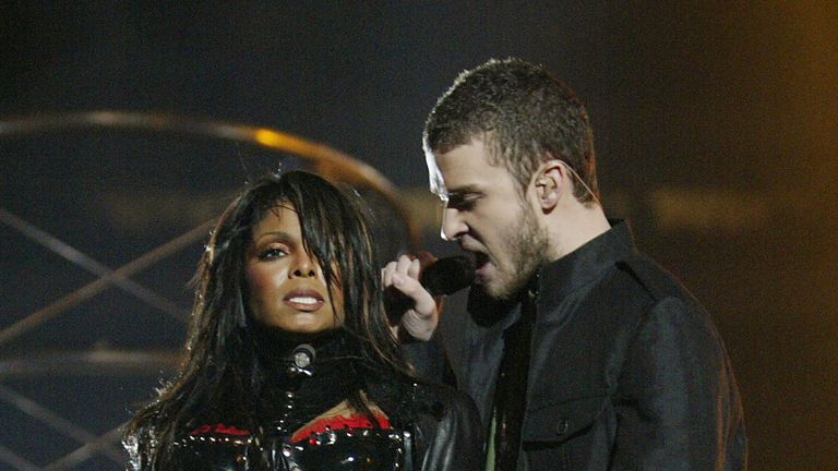 HOUSTON, TX - FEBRUARY 1:  Singers Janet Jackson and surprise guest Justin Timberlake perform during the halftime show at Super Bowl XXXVIII between the Ne