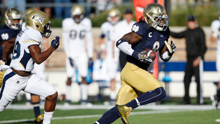 SOUTH BEND, IN - SEPTEMBER 19: Jaylon Smith #9 of the Notre Dame Fighting Irish returns a fumble against the Georgia Tech Yellow Jackets in the third quart