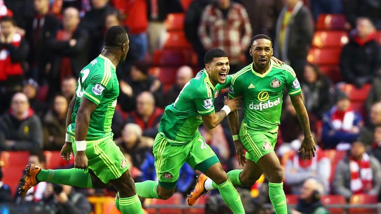 Jermain Defoe (R) of Sunderland celebrates scoring his team's second goal