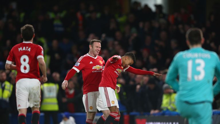 Jesse Lingard of Manchester United celebrates with Wayne Rooney 