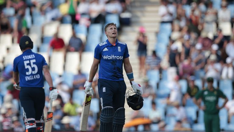 England batsman Joe Root (2-L) celebrates after scoring a century