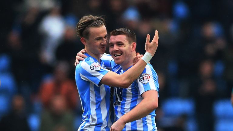 Coventry City's John Fleck celebrates scoring his goal against Bury with James Maddison (left) 