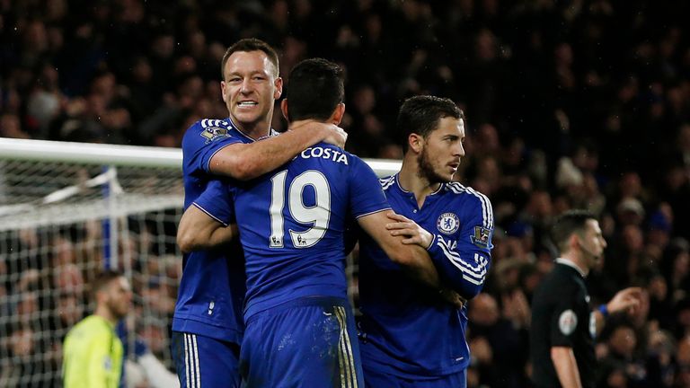 Chelsea's Brazilian-born Spanish striker Diego Costa (C) celebrates with Chelsea's English defender John Terry (L) 