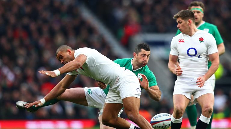 Jonathan Joseph of England and Rob Kearney of Ireland compete for the ball during the Six Nations match at Twickenham