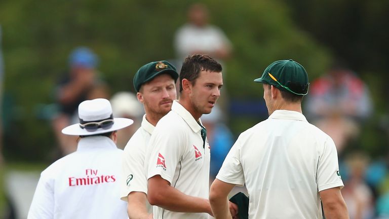Josh Hazlewood (centre) reacted angrily when Kane Williamson was given not out on review
