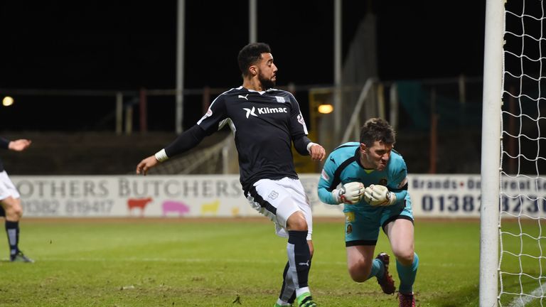 Dundee's Kane Hemmings doubles the lead for his side against Dumbarton