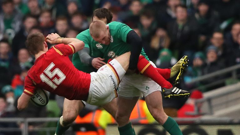 Ireland's Keith Earls (right) is tackled by Wales' Liam Williams 